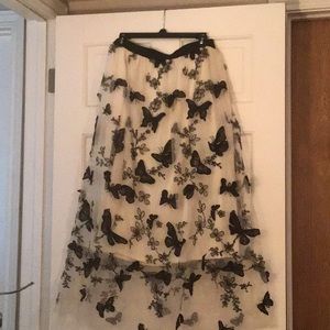 Black Butterflies with a Cream background.